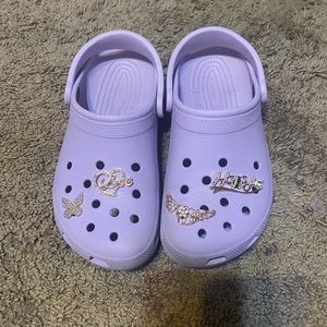 Purple Crocs (with charms)
